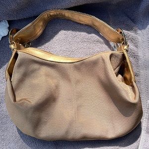 Kathy Van Zeeland gold tone purse